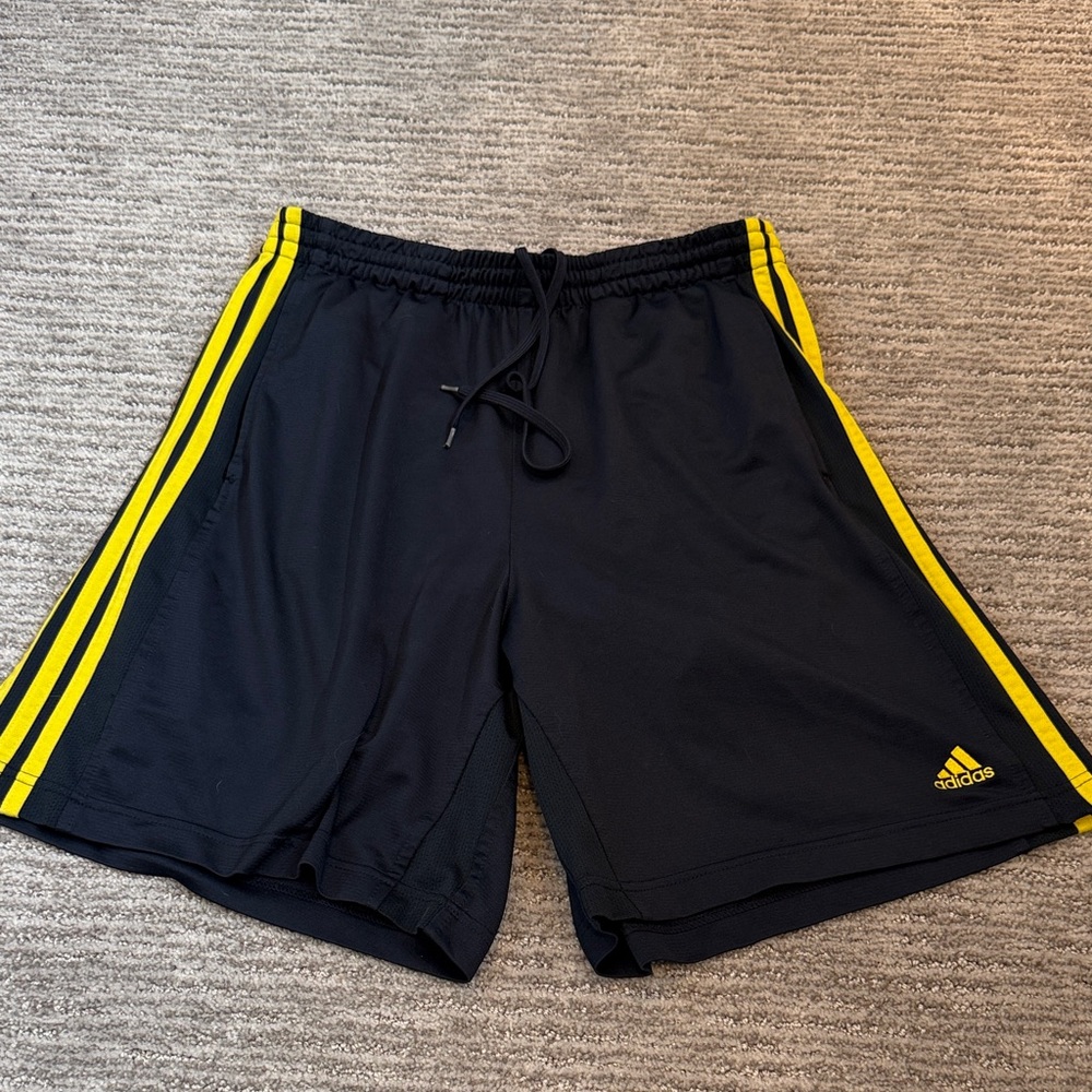 Adidas Men's Black Athletic Shorts with Yellow Stripes and lined inside